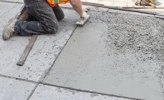 Professional repairing a concrete floor in Fort Worth, TX