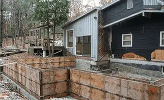 Prepared site with foundation forms for home remodeling and addition project in Fort Worth, TX